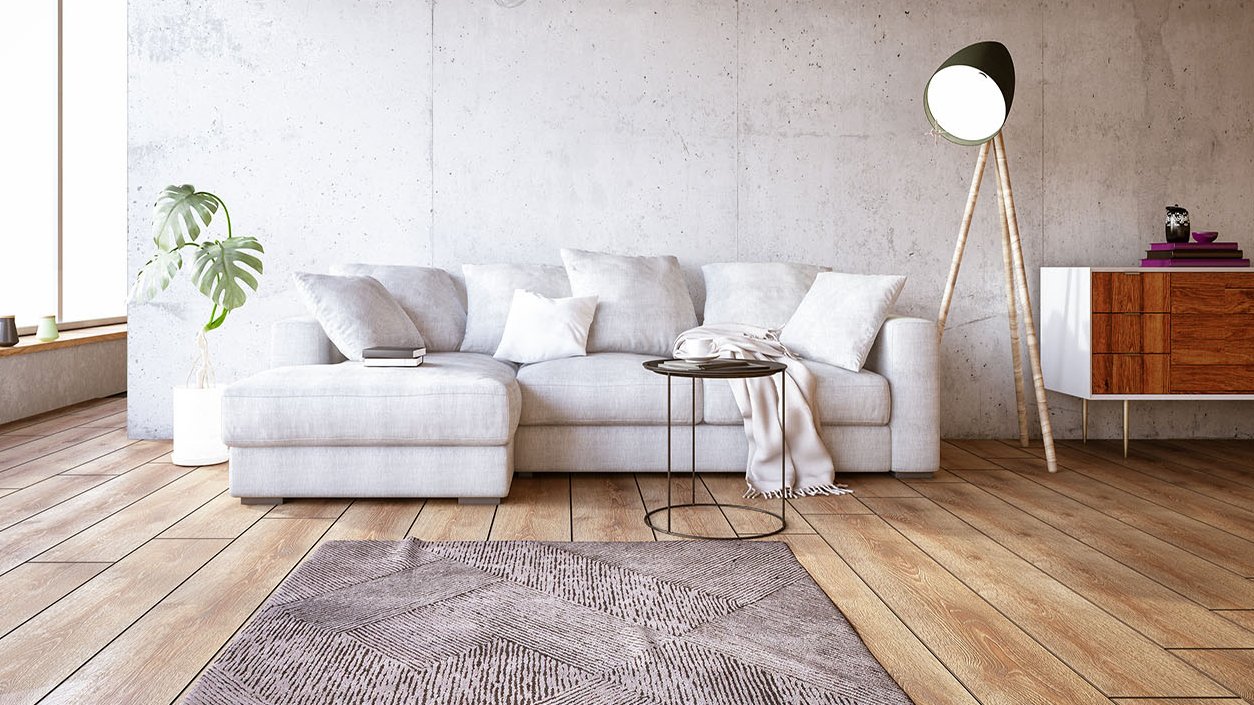 Weiße Couch auf einem hellen Echthozboden